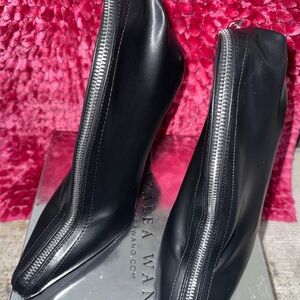 Sleek Black Heeled Boots with Silver Zipper